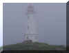 Louisbourg Lighthouse in fog July 10 05 P7090083.JPG (473921 bytes)