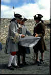 Yvon on the left (with Dave and Frank), looking over military plans ~ Parks Canada, Fortress of Louisbourg, 5k-6-57s.jpg